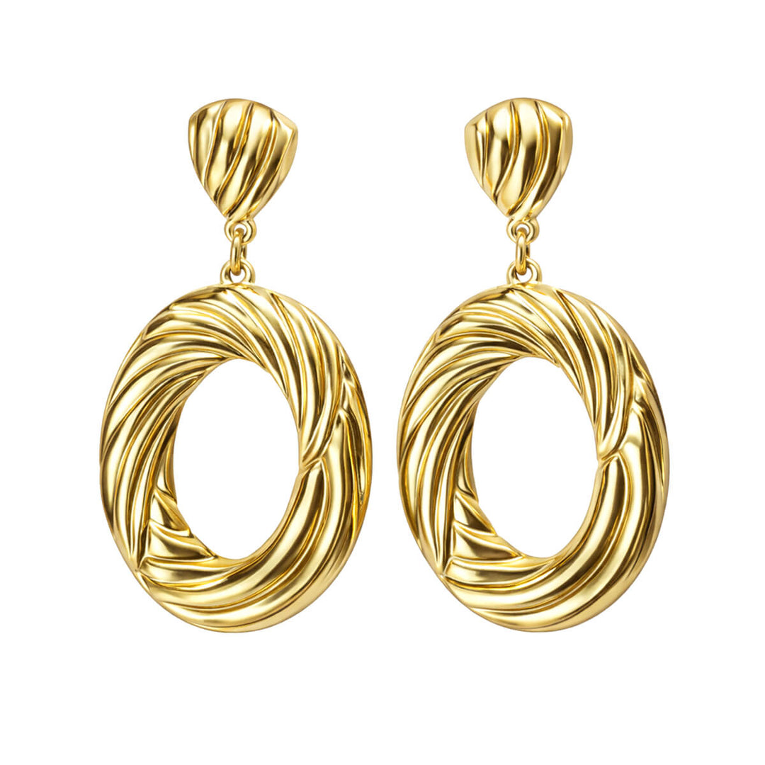 Kuvioidut ovaalirenkaat roikkuvat korvakorut