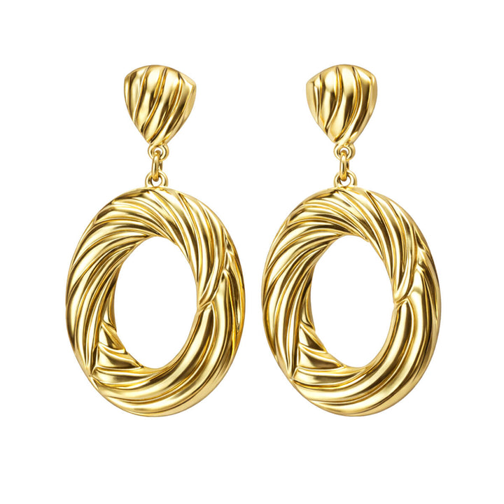 Kuvioidut ovaalirenkaat roikkuvat korvakorut