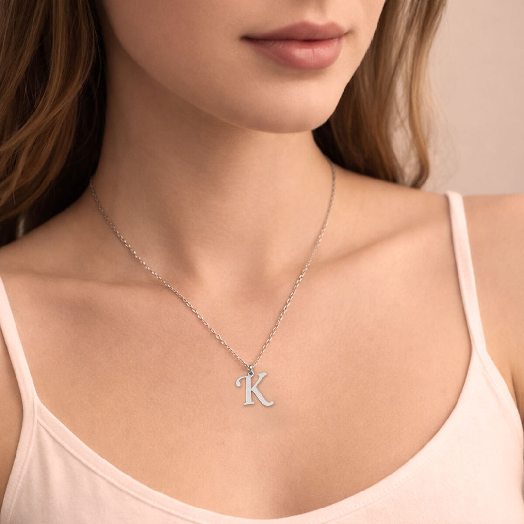 Kirjainkaulakoru kaunokirjain – kirurginteräs (316L) - Ninja.fi