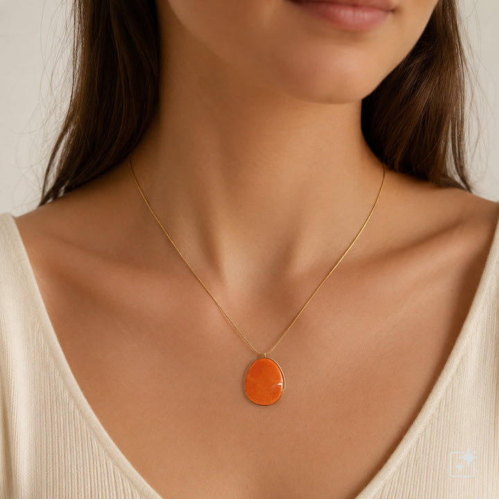 Gold-tone steel necklace with an orange pendant (316L steel)