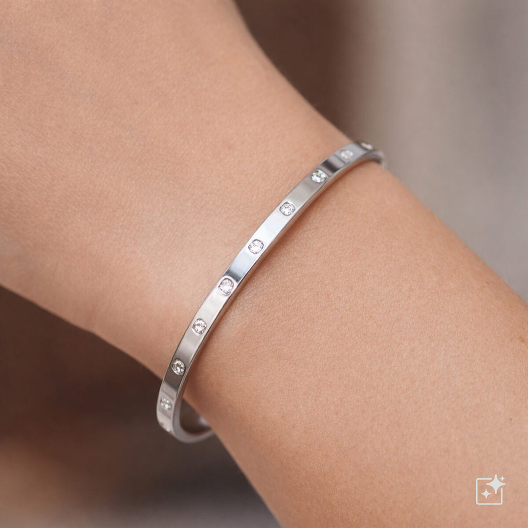 Smal armbandring i zirkoniumoxid med fyrklövermotiv och gångjärn (316L-stål)