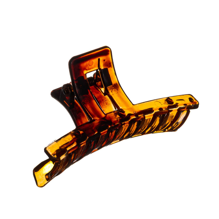 Böjt hårspänne av plast med hajtand 7,5cm