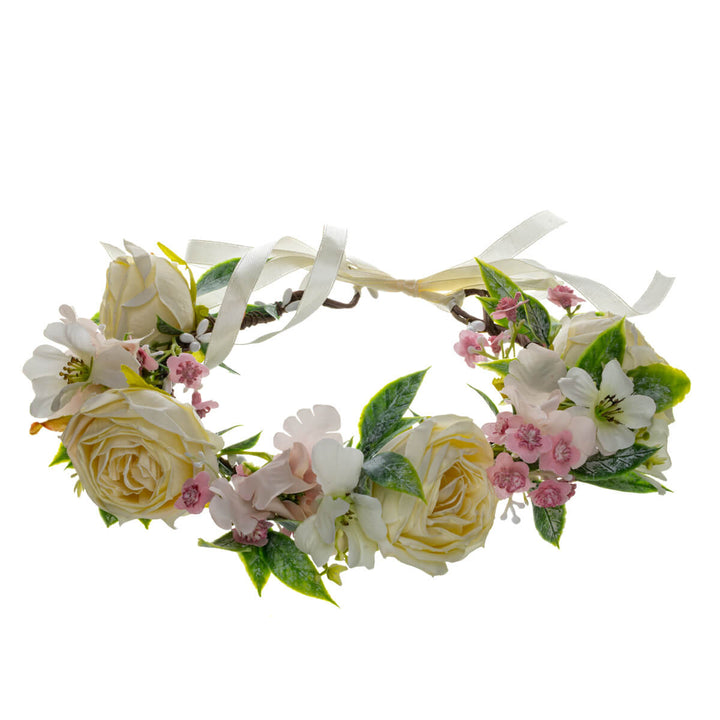 White rose wreath with light pink flowers