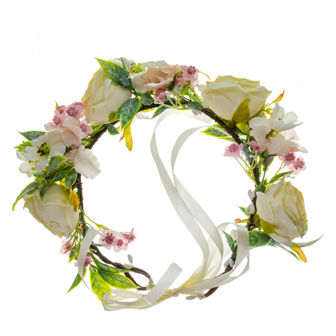 White rose wreath with light pink flowers