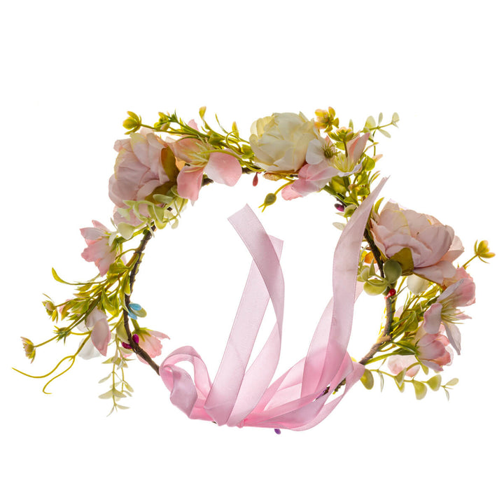 A light pink floral wreath with a white rose