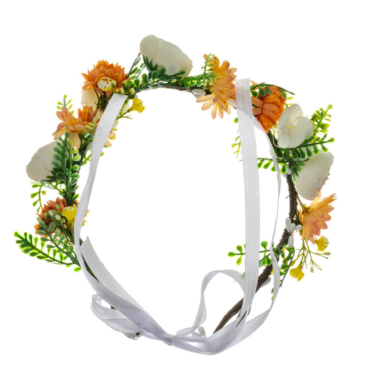 A warm-toned floral wreath with orange and white flowers