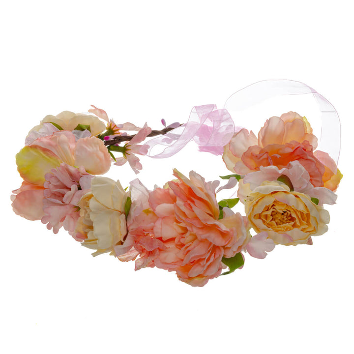 A pink floral wreath with large flowers