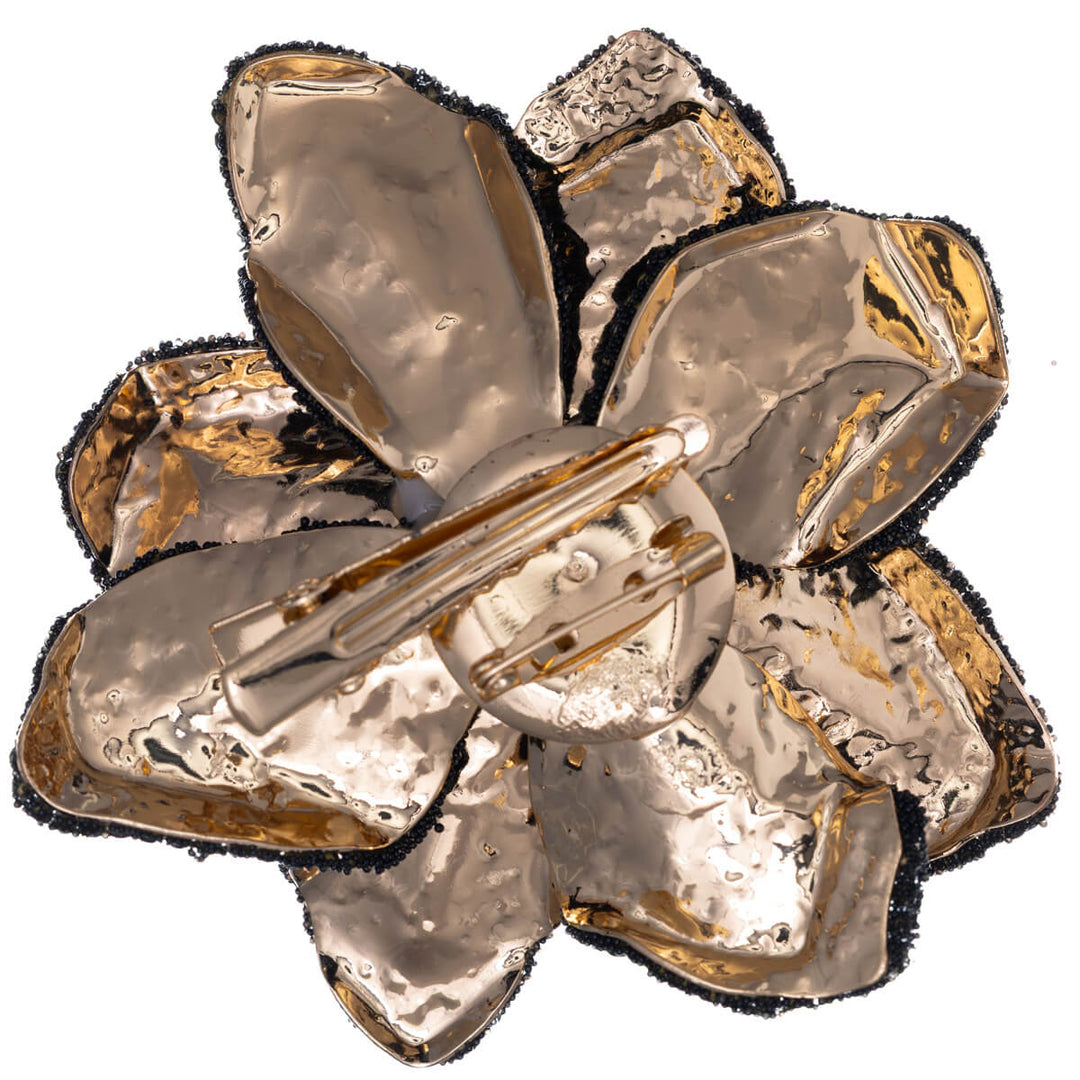 Iso kimalteleva kukka rintakoru lasikivillä