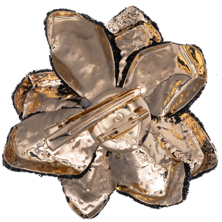 Iso kimalteleva kukka rintakoru lasikivillä