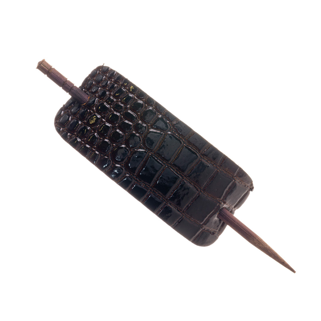 Läderimitation hårspänne 1 st