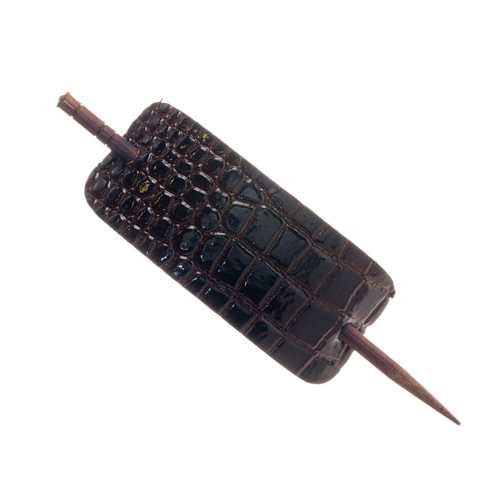 Läderimitation hårspänne 1 st