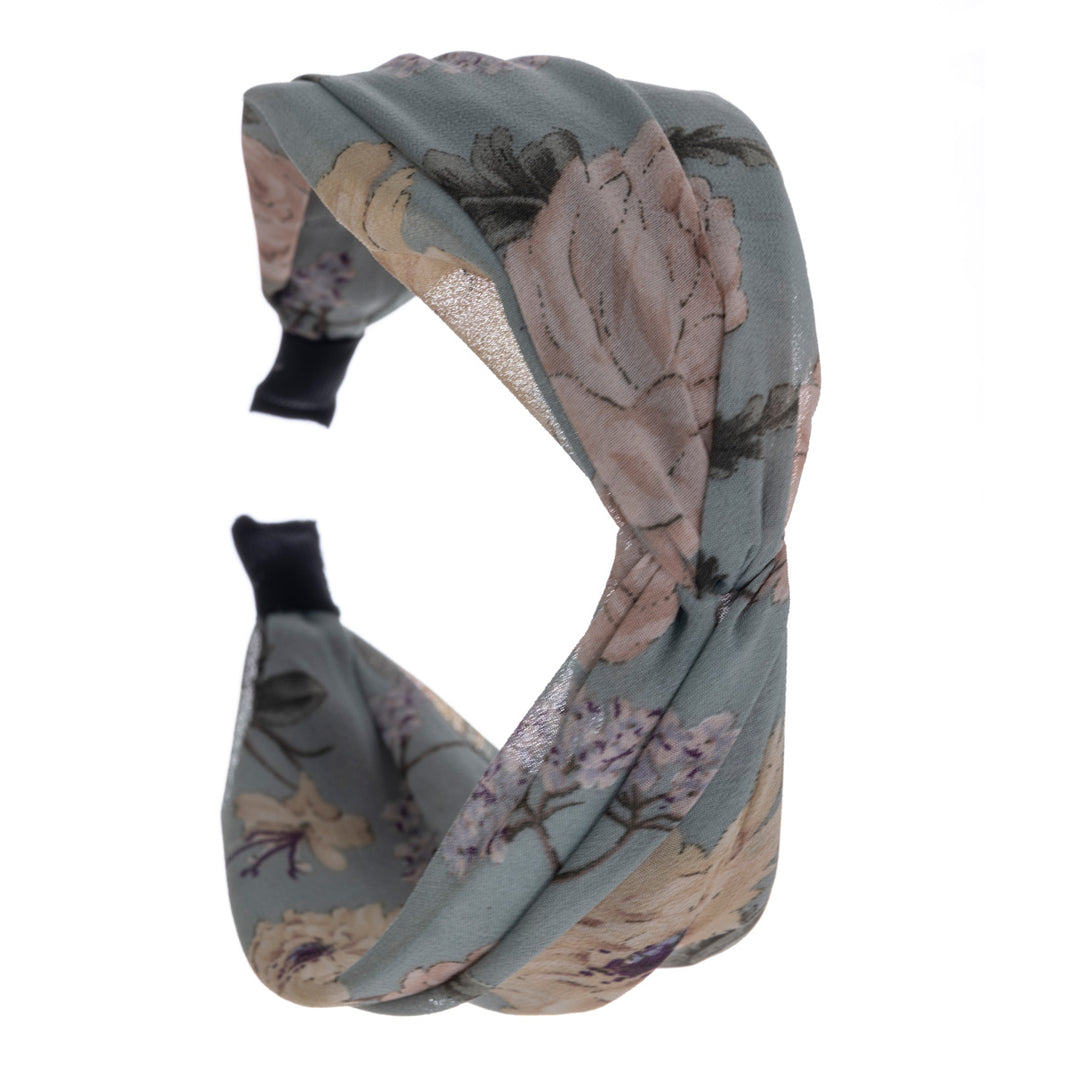 En blomma mönstrad bred hårkrage