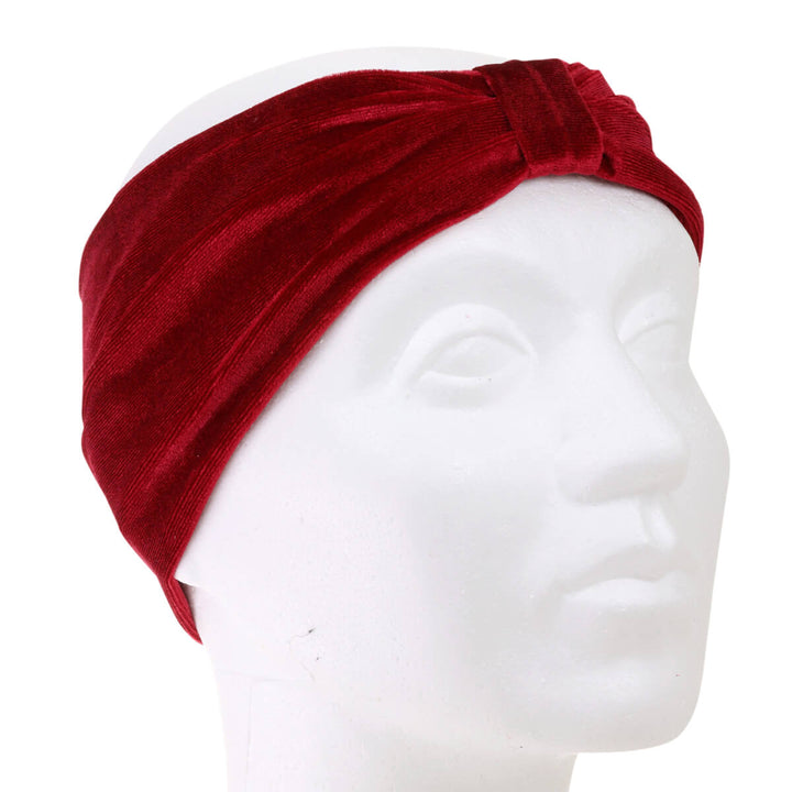 A velvety elastic wide hairstyle with a knot