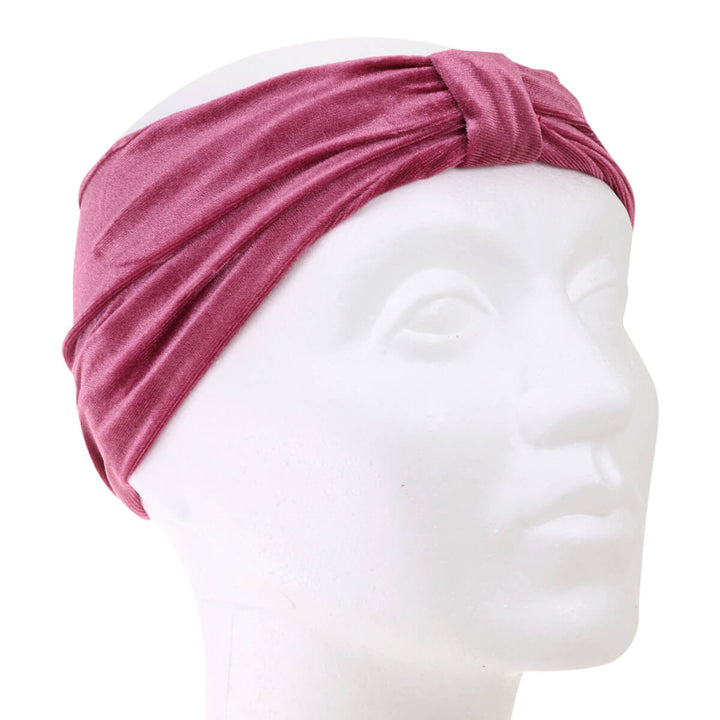 A velvety elastic wide hairstyle with a knot