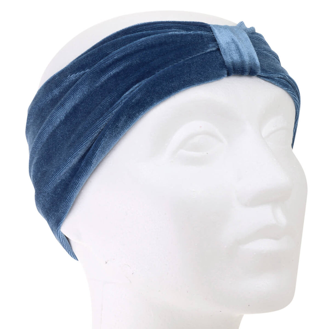 A velvety elastic wide hairstyle with a knot