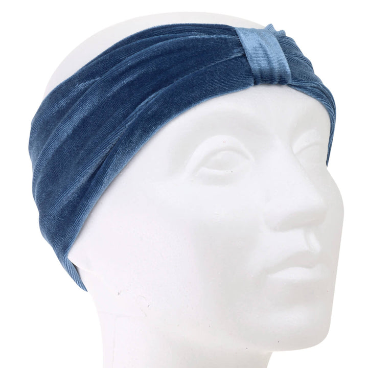 A velvety elastic wide hairstyle with a knot