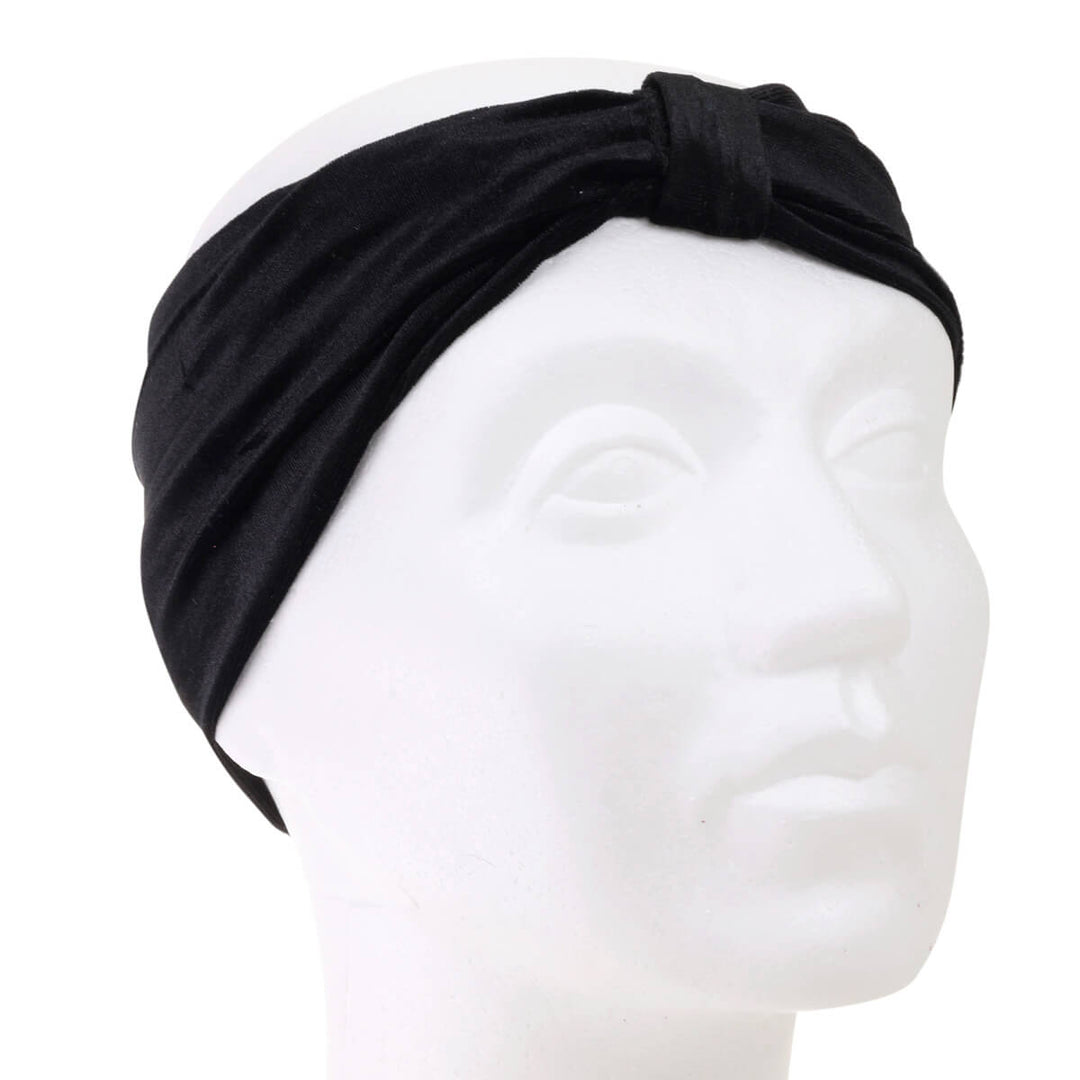 A velvety elastic wide hairstyle with a knot