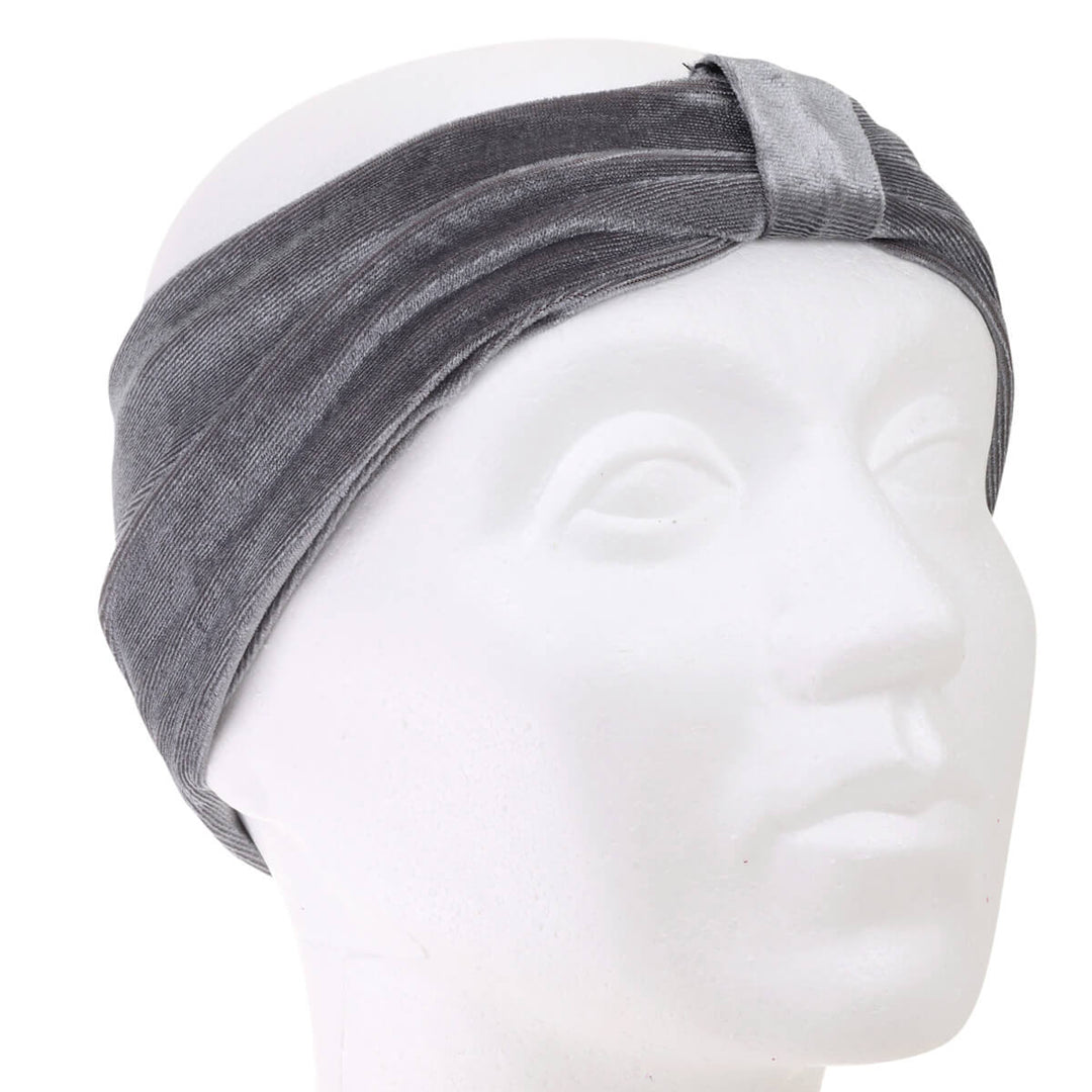 A velvety elastic wide hairstyle with a knot