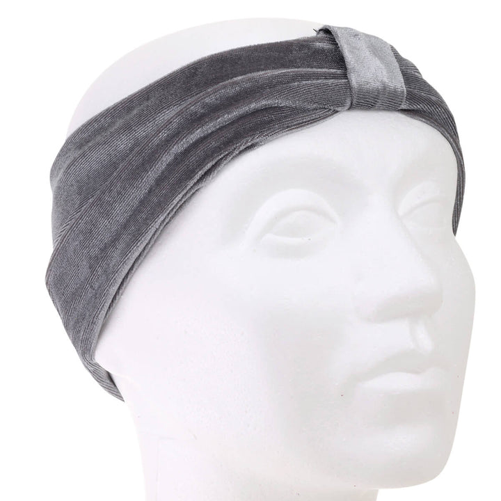 A velvety elastic wide hairstyle with a knot