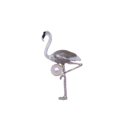 Flamingo rintakoru helmellä